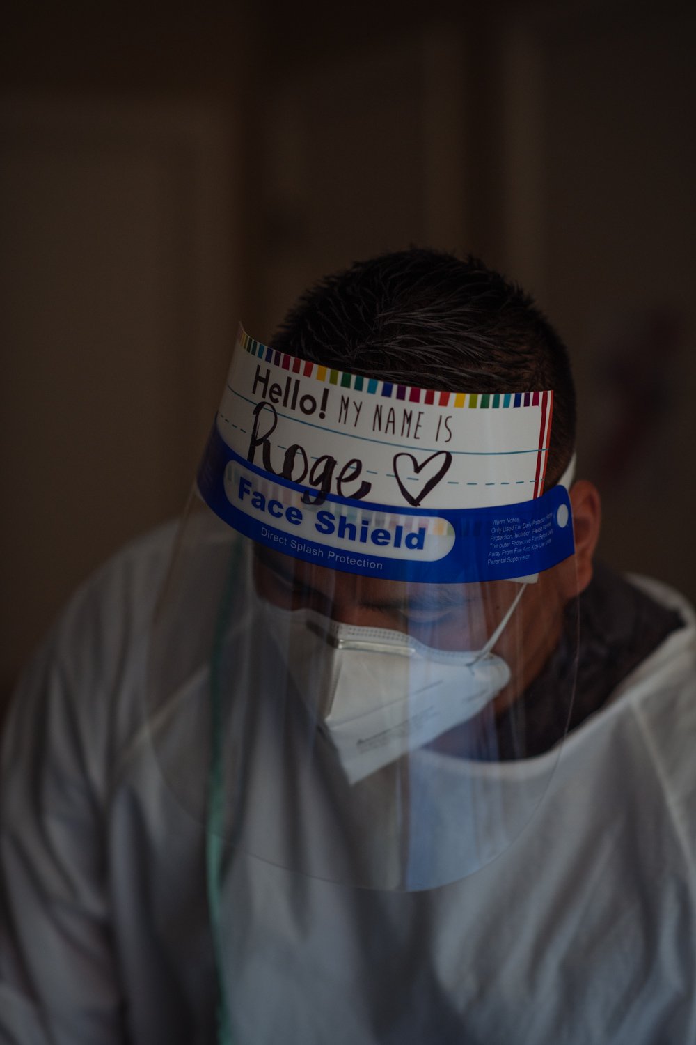  Rogelio Ramirez, a certified nursing assistant, tending to Leslie Riggins. 