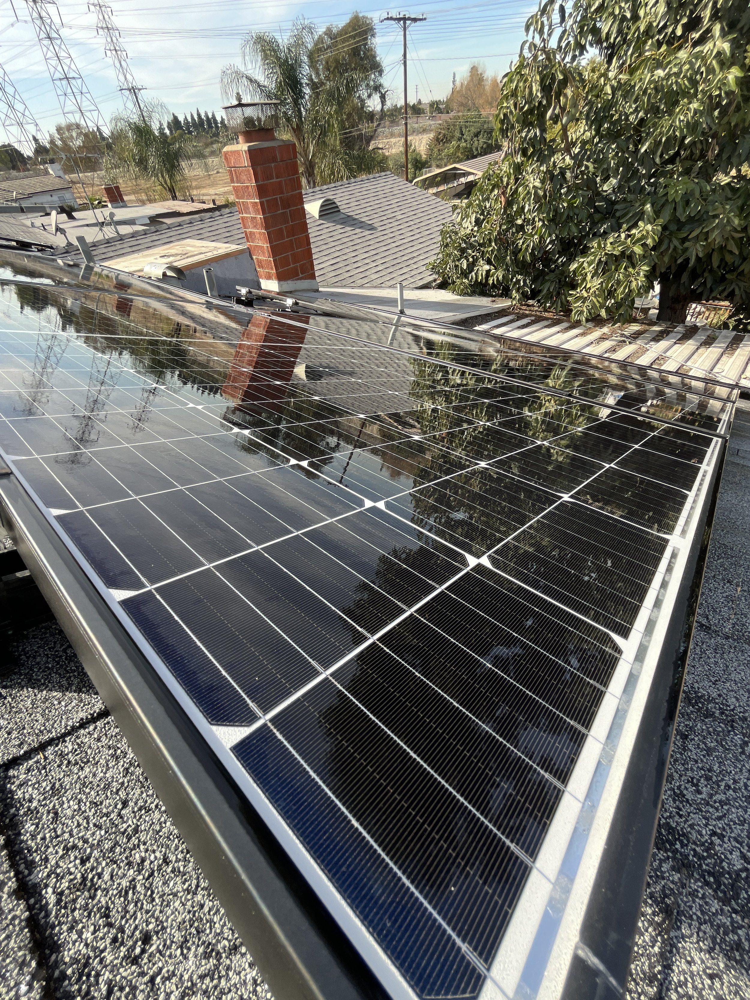 This Downey, California home had dust-covered rooftop solar panels due to nearby construction and seasonal debris. Guru Solar Cleaning performed a detailed cleaning using a non-abrasive soft-brush system and 100% deionized water, safely removing grim