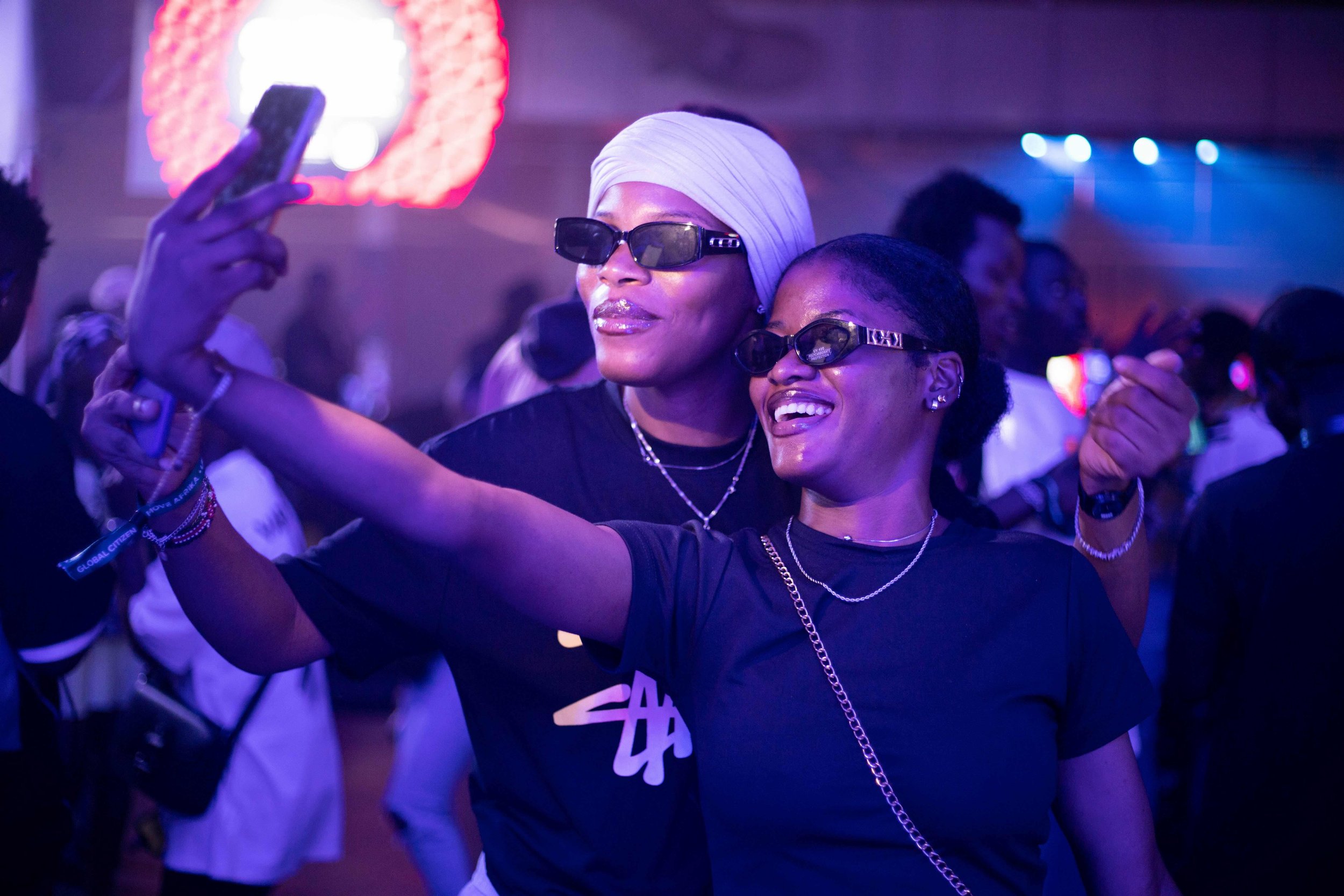 The energy was electric as fans eagerly captured every magic moment at the Move Afrika Lagos show. | Getty Images and Emmanuel Ighogboja for Global Citizen